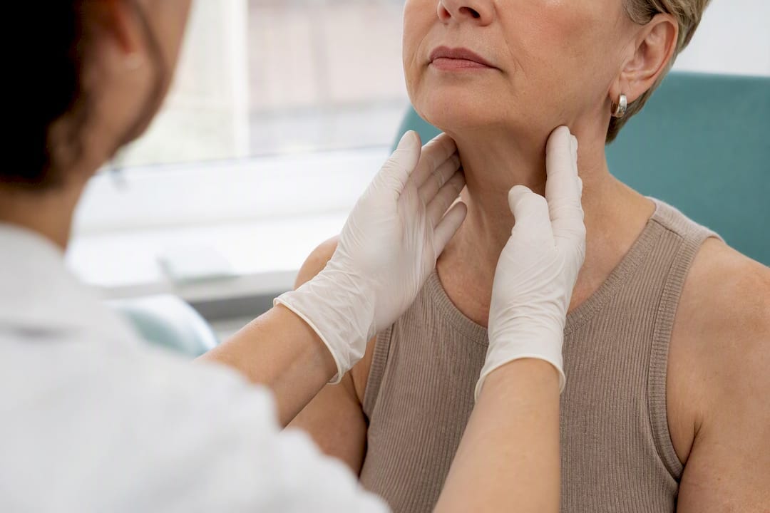 Clinician assessing neck skin thickness